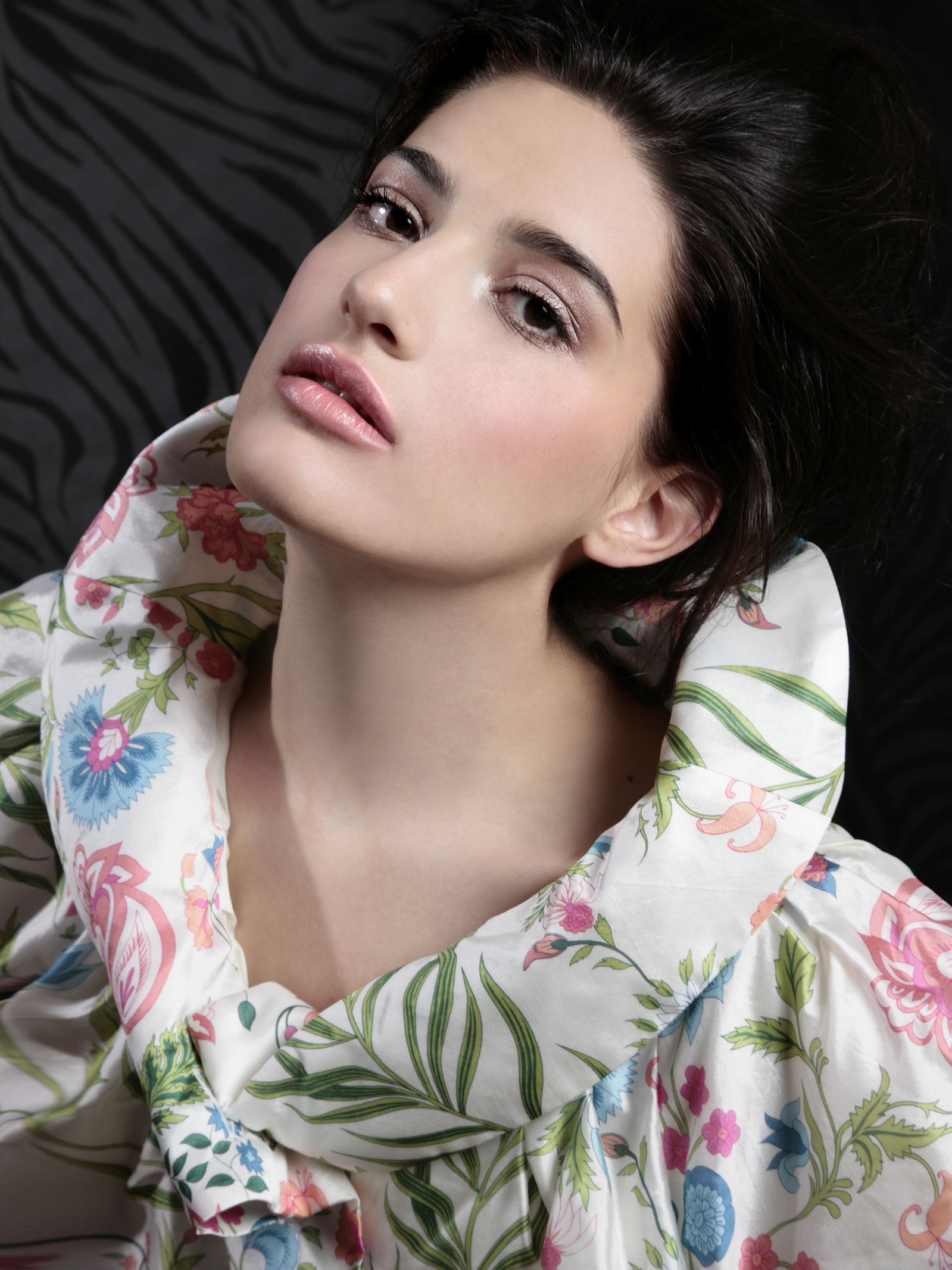 Fashion direction portrait with dramatic tailoring.